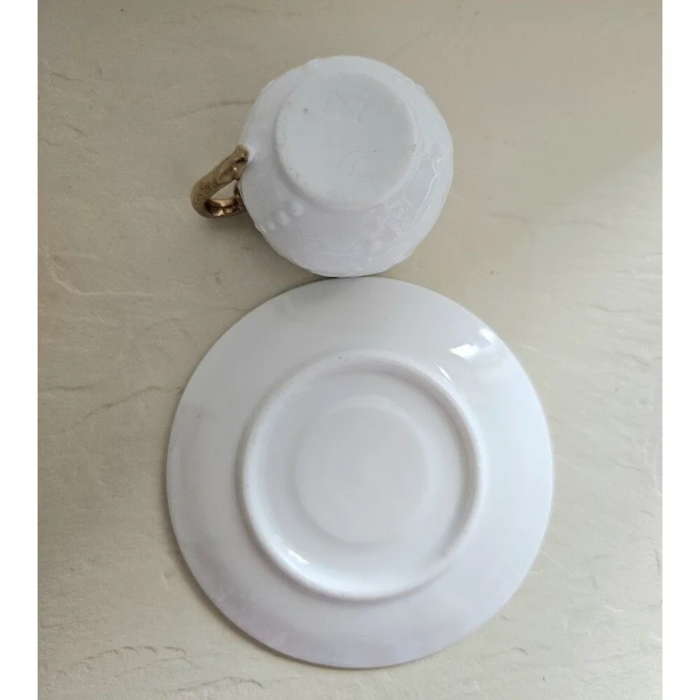 Vintage Miniature White Raised Design Cup And Saucer